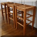 F23. Set of 3 rush seat counter height stools. 26”h 